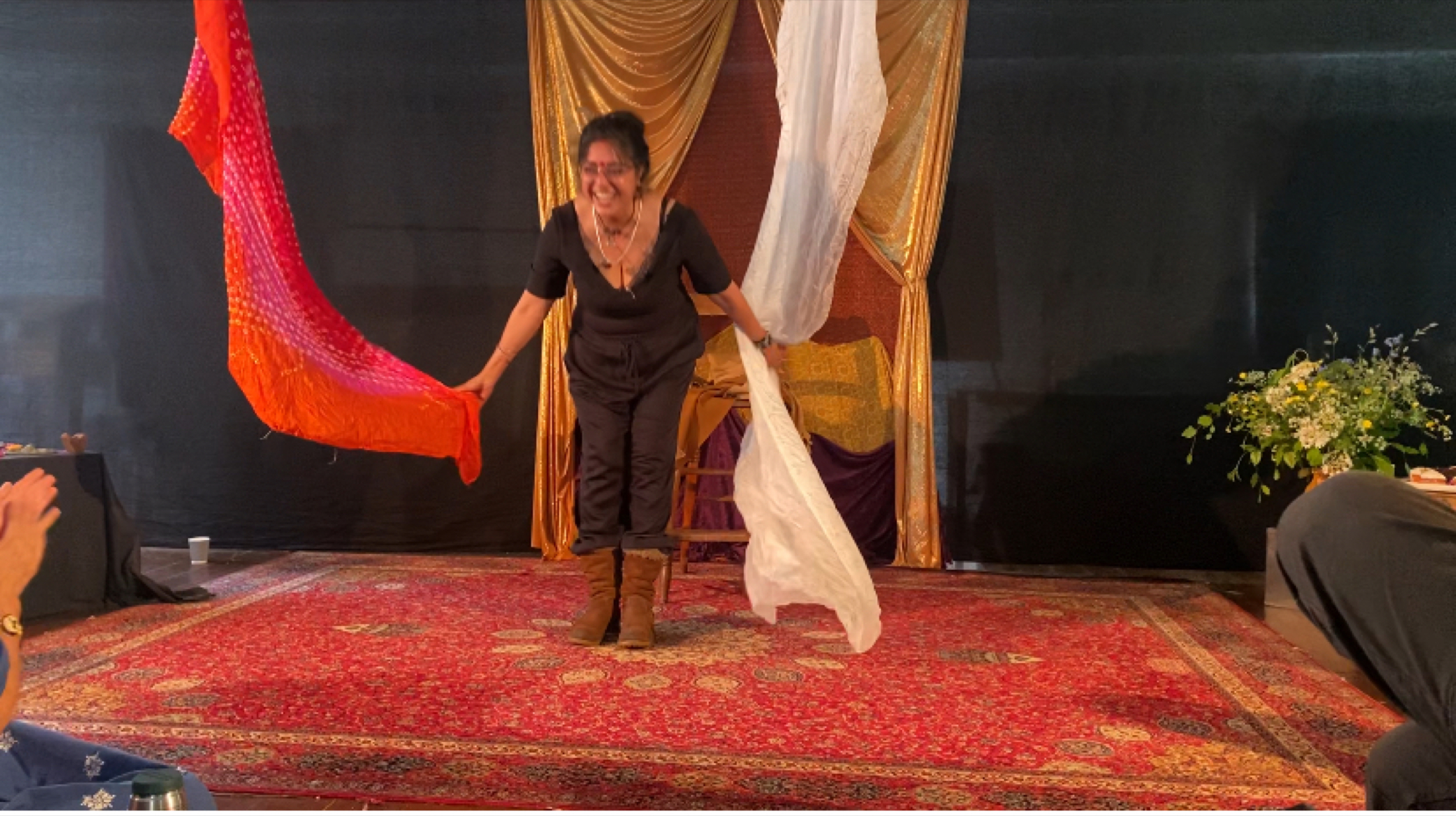 Wide composition showing atmosphere around a storytelling event.